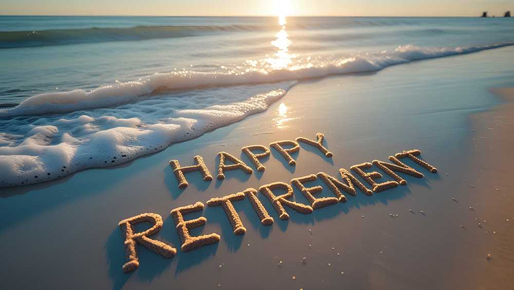 Best coastal areas to retire. Beach with Happy Retirement written in the sand