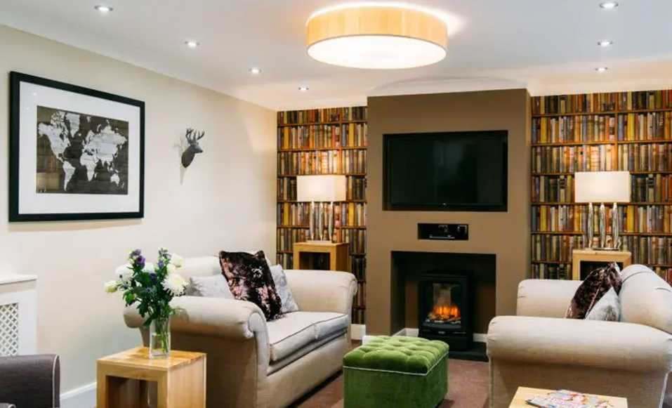 The library lounge at Sherwood Lodge Care Home in Preston