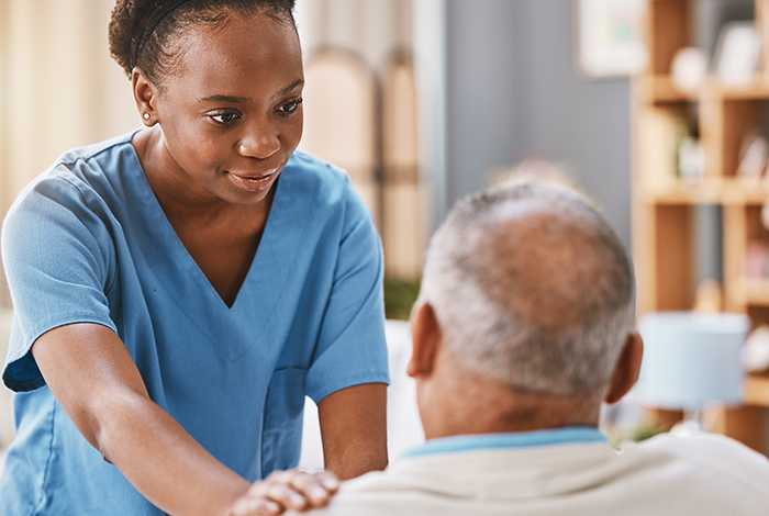 Health Care Assistant with elderly man
