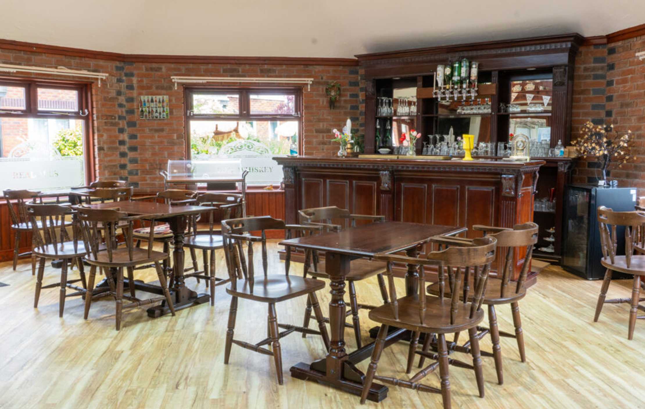 Forget-Me-Not pub interior at Neville Williams House care home