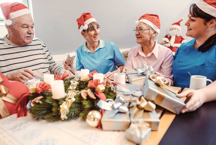 chritmas-christians celebrating christmas - older people celebrating in their home