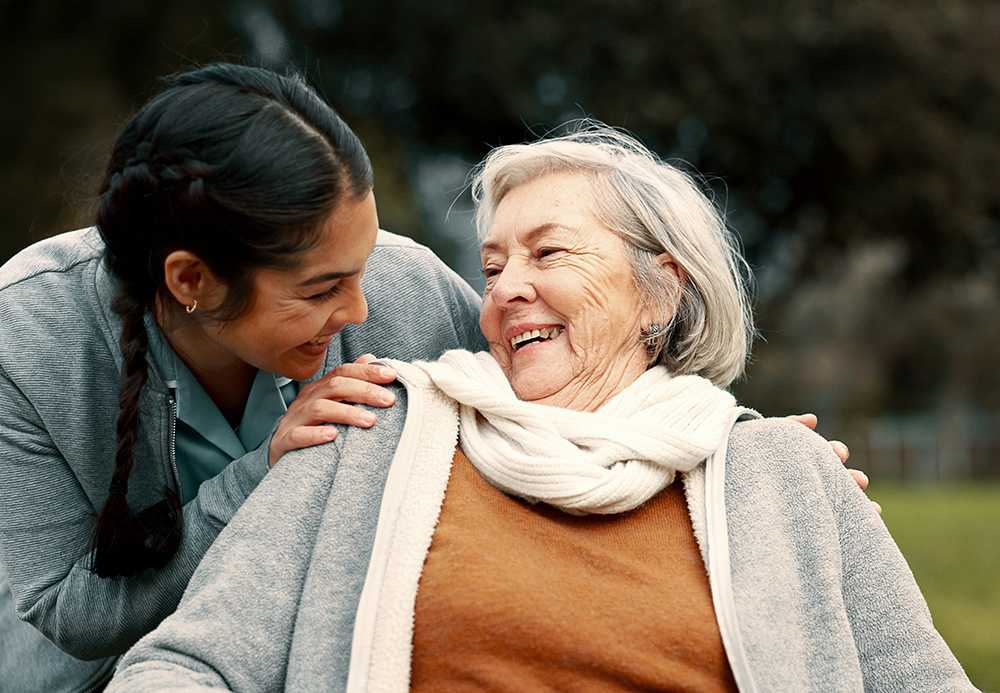 Old lady with younger woman in the context of person-centred care