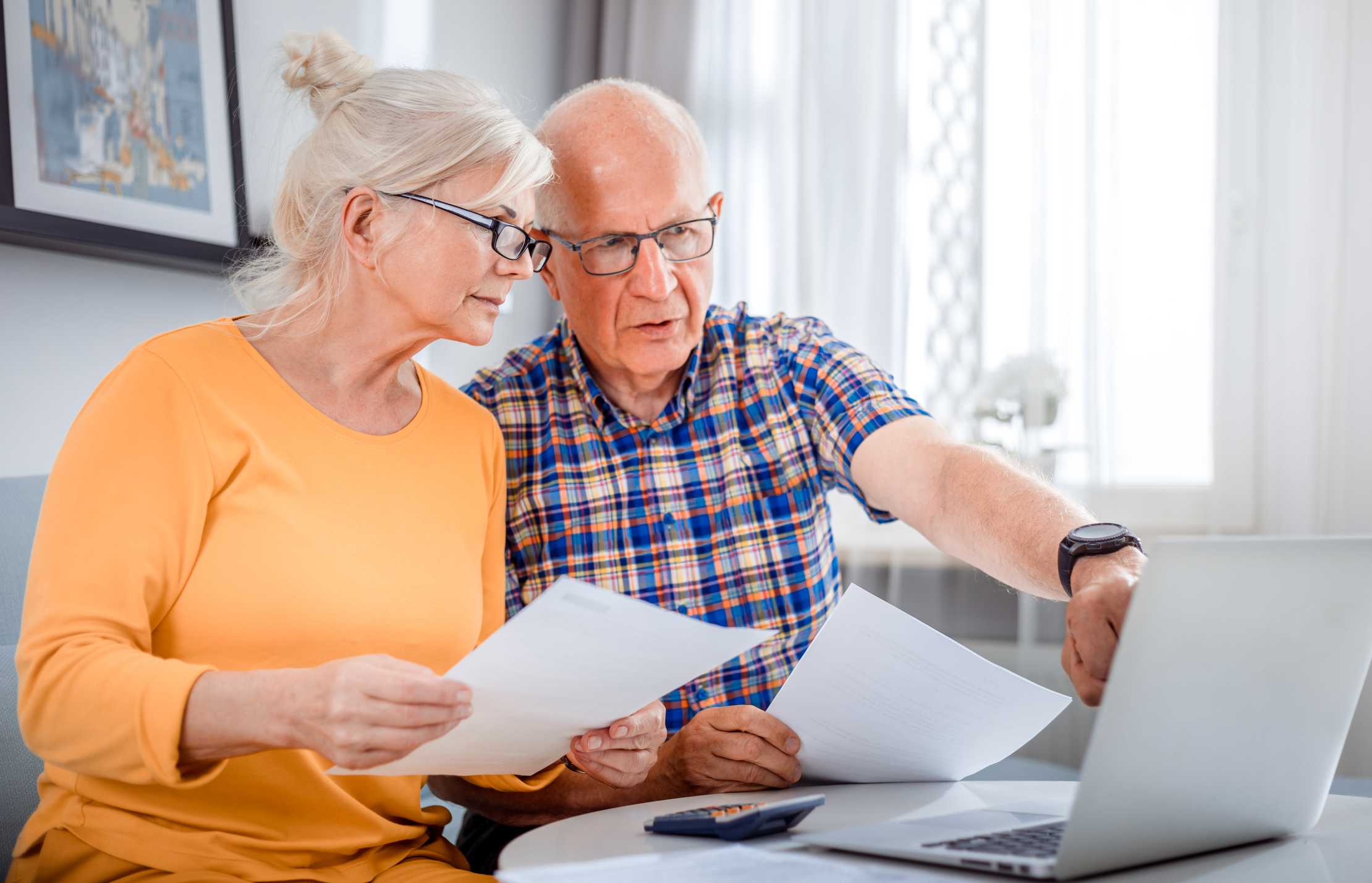 An older couple evaluating the difference between a retirement home and nursing homes