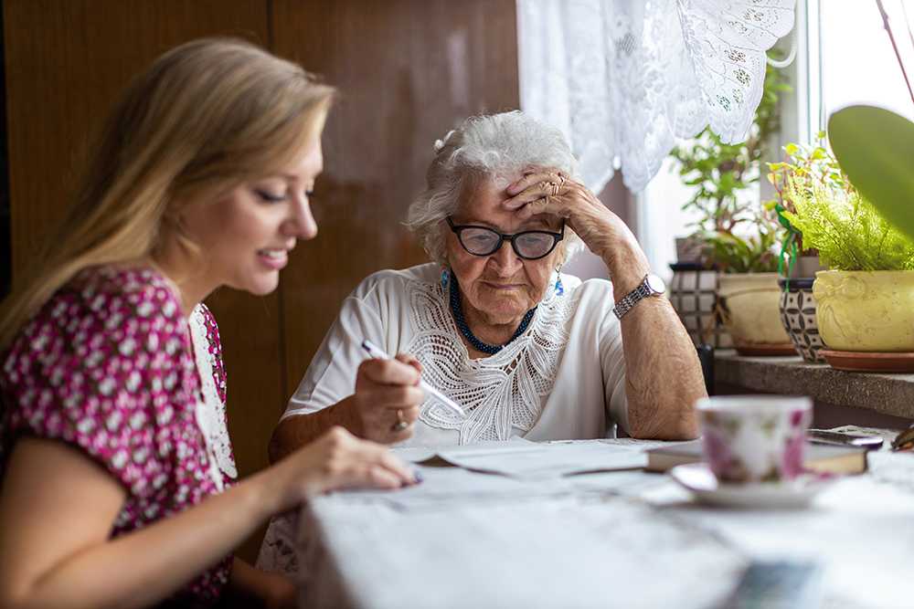 Elderly-lady-with-young-lady-home-care-vs-nursing-home-care