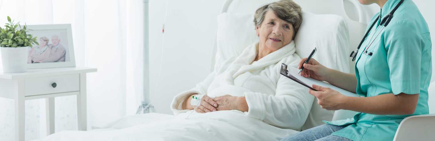 older woman waits in hospital bed to be discharged from hospital, older adult waiting for appropriate care