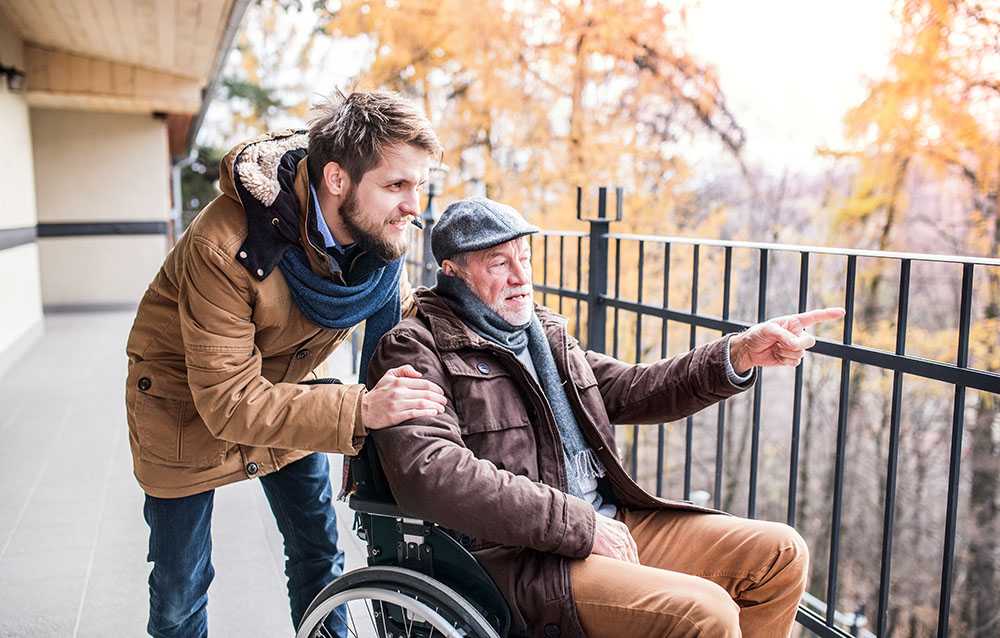 young man engaged in carers work