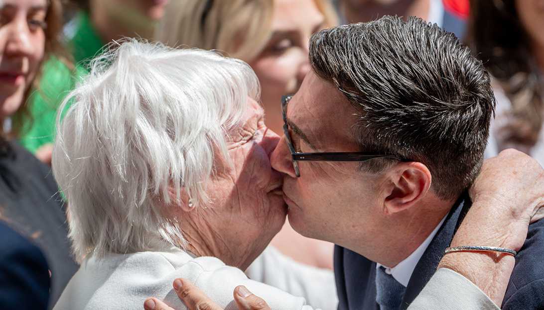Andy Burnham embracing his mother in the crowd gathered in Downing Street to see him enter number 10 as Prime Minister for the first time