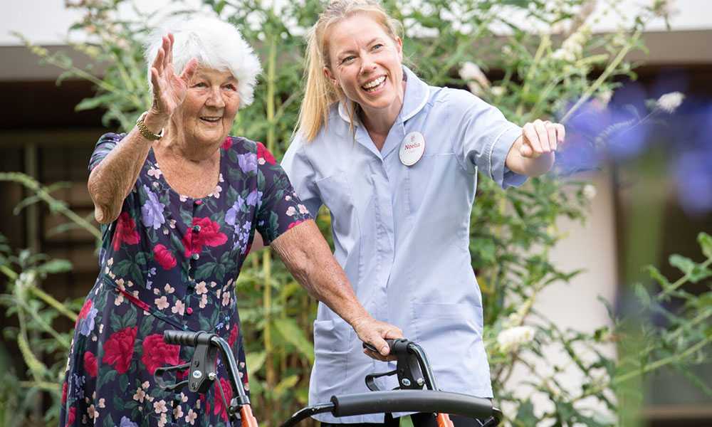 Cardogan care home in Exeter. Happy nurse with elder